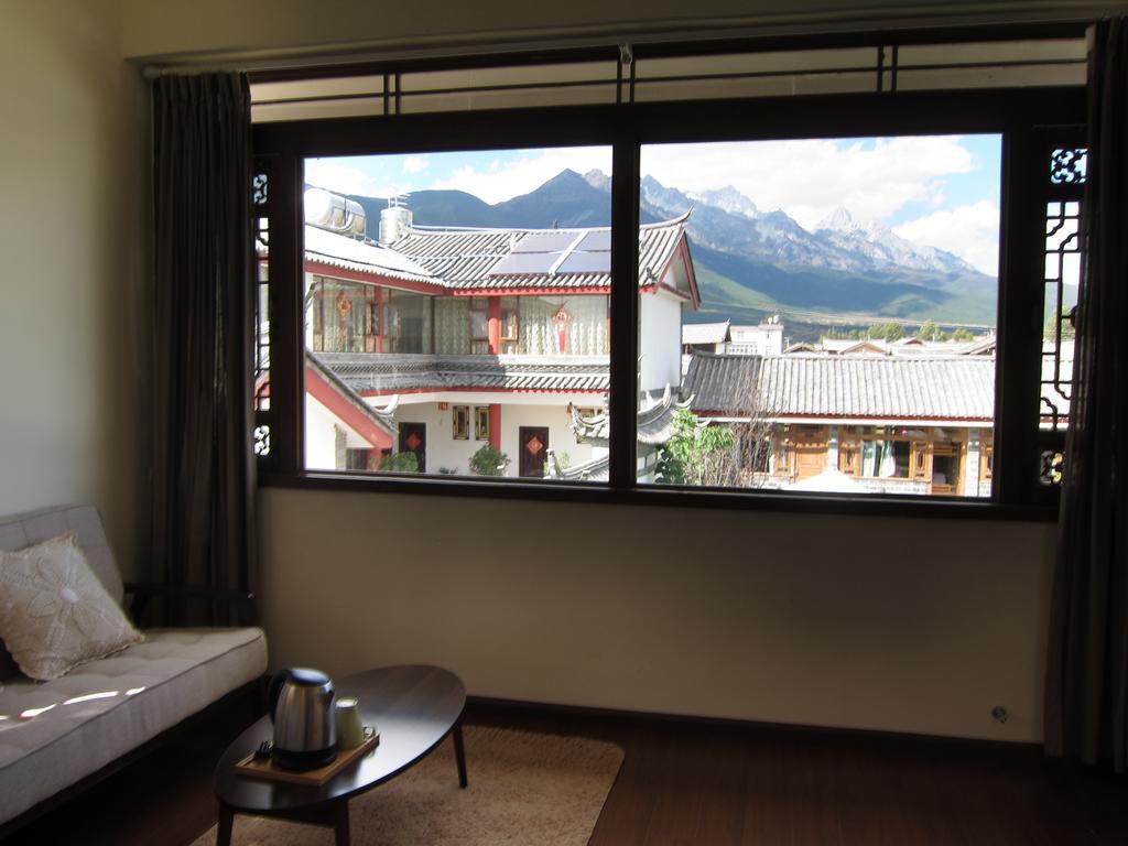 Lijiang Baisha There International Youth Hostel Номер фото